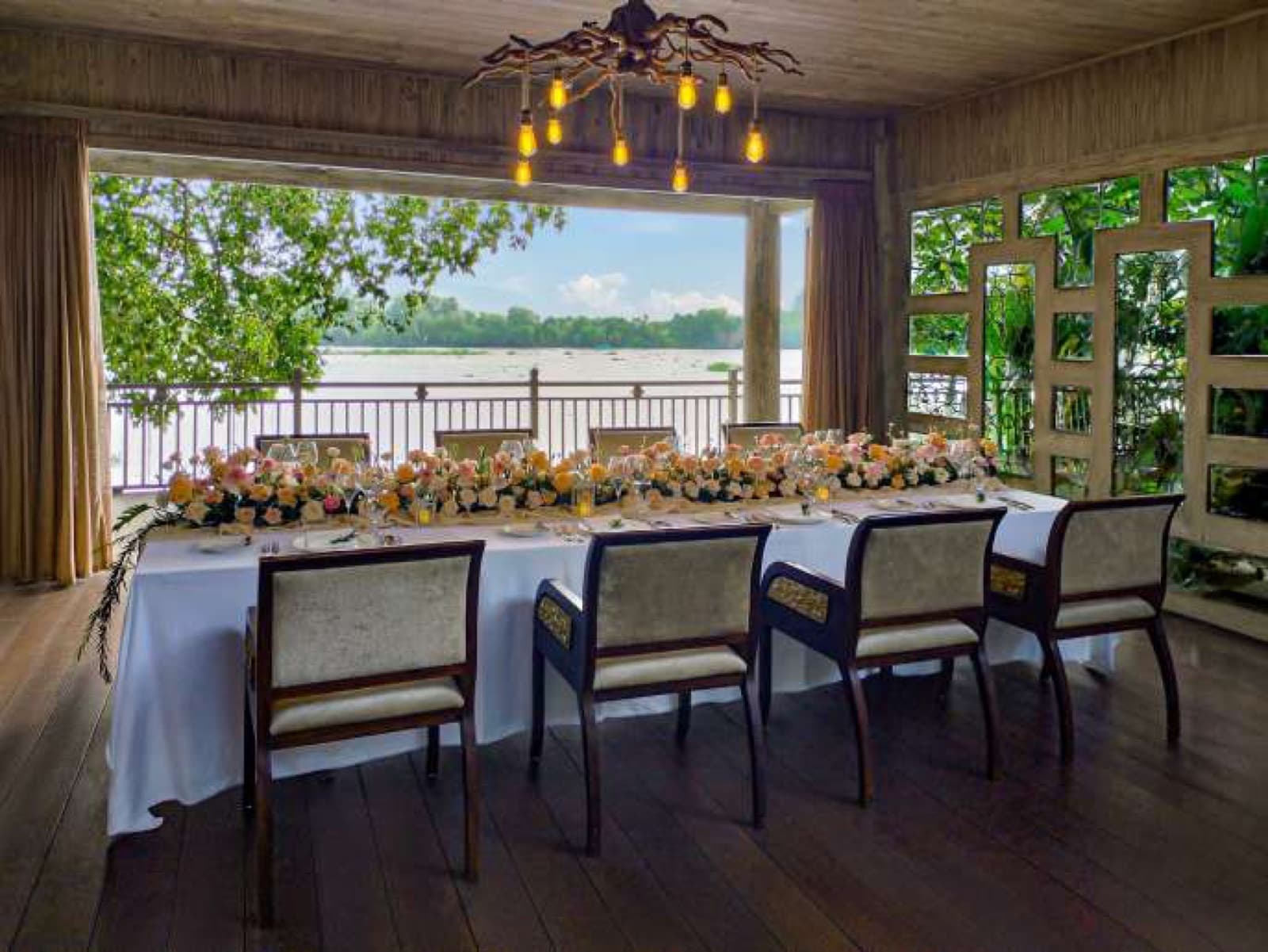 Meeting table arranged in a U-shape with an open river view