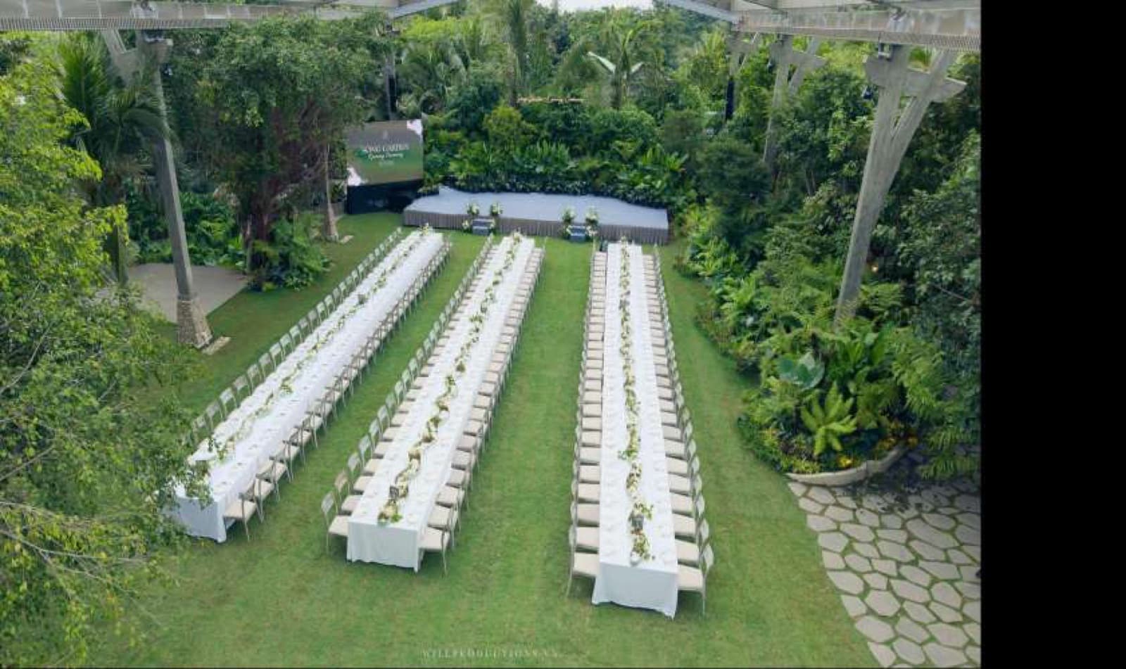 Aerial view of theatre-style seating on the Sông Garden lawn