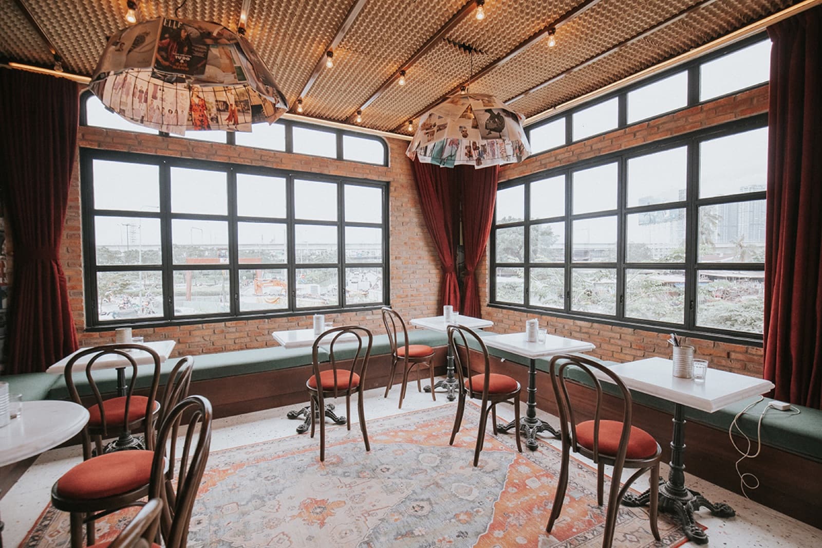 Indoor Bistro seating at Le Café des Stagiaires