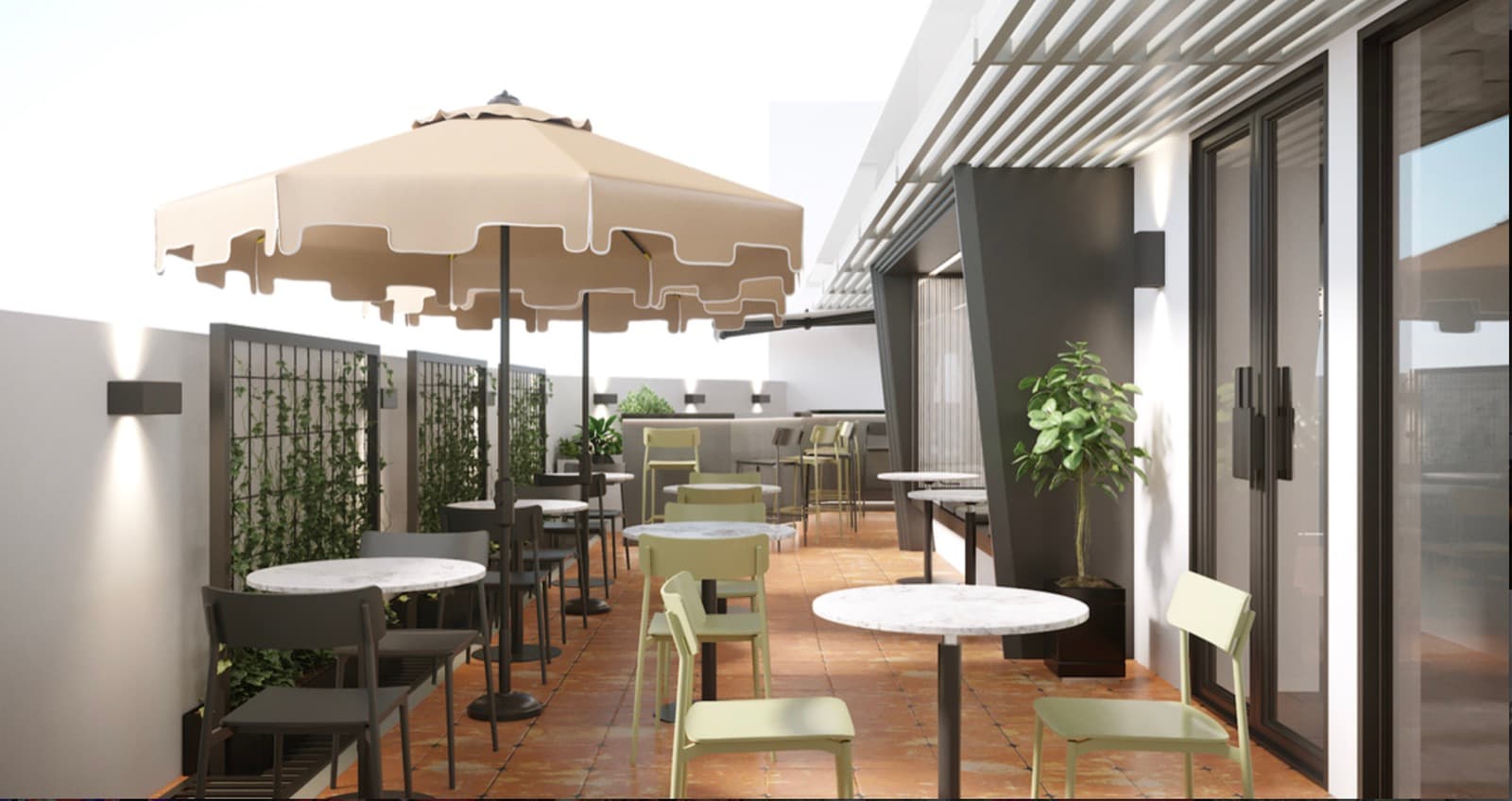 Rooftop terrace furnished with cafe tables, umbrella and greenery