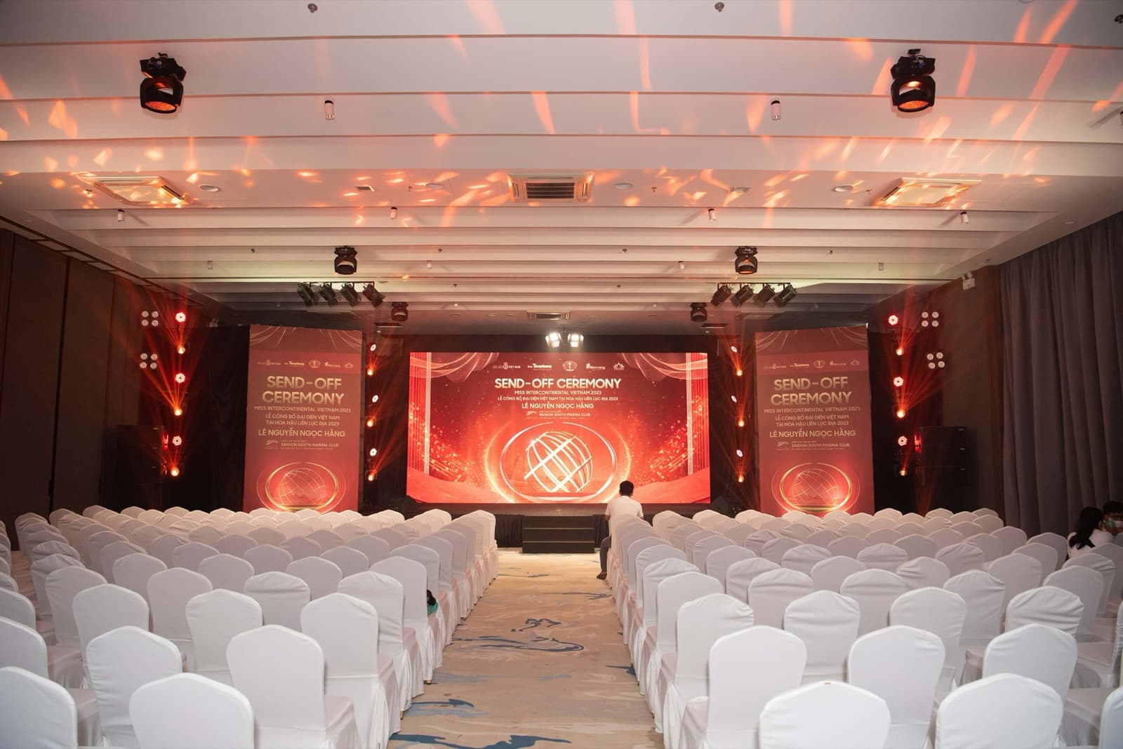 Seawind Ballroom arranged for a ceremony with theatre seating, stage and projection